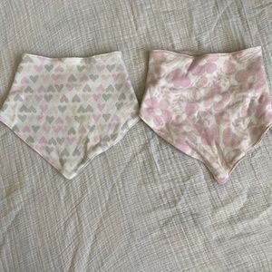 Pair of two hanker chief baby bibs.